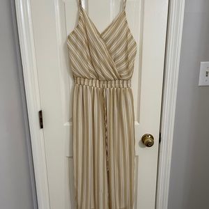 Small light yellow with stripped pattern romper